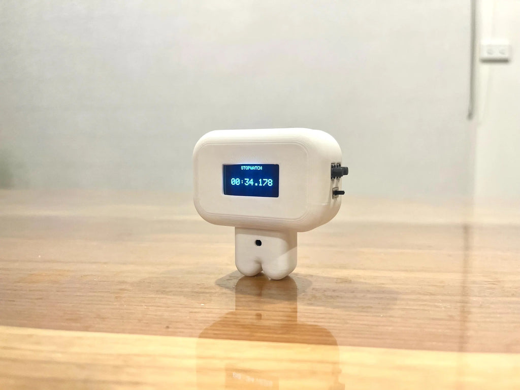 PocketBot- Interactive Desktop Robot with Touch and Movement Reaction and In-Built Stopwatch